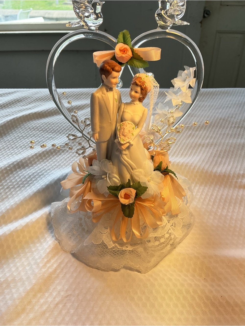 Romantic Bride & Groom Cake Topper with Peach Floral Accents